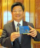 Arthur Lin, Sunix founder and CEO, poses with one of the company's products