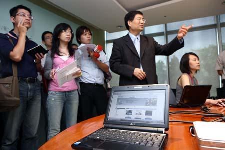Jerry Shen, president of Asustek operating the Eee services website features Eee Storage and Download