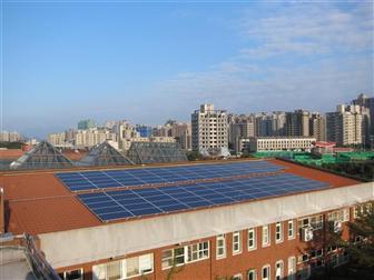 A rooftop PV system as part of a micro-grid in a large community