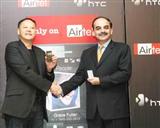 HTC CEO Peter Chou and Syed Safawi, president of mobile sevice unit of Bharti Airtel