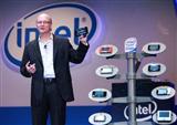 Shane Wall, VP of Intel's Mobility Group and Director of Strategic Planning, holding USI's MID 160