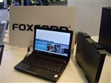 Foxconn's Qbook netbook (left) and Qbox nettop (right)