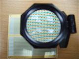 LED packaging board under a magnifier