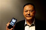 HTC CEO Peter Chou holding HTC HD2
