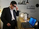TH Tung, Pegatron chairman, trying out a 3D notebook