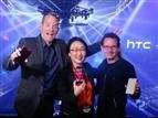 Cher Wang (center) presents the HTC One A9 in New York