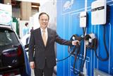 Lite-On Technology CEO Warren Chen with charging piles BMW i3