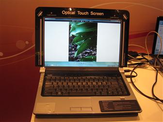 A Dell notebook that features Quanta's Optical Touch Screen