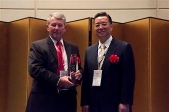 Left: Denny McGuirk, president and CEO of SEMI. Right: Toshio Maruyama, senior executive advisor at Advantest.