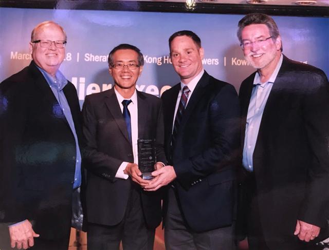 Pictured left to right: ON Semiconductor's President and CEO Keith D. Jackson; Indium Corporation's Weng Fai Pang
