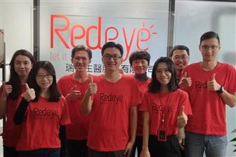 RedEye founder Nelson Yan (center and his team