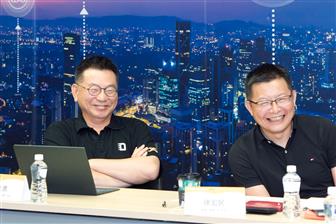 Colley Hwang, founder & president, DIGITIMES (left) and Winston Hsu, professor, Department of Computer Science and Information Engineering, NTU
