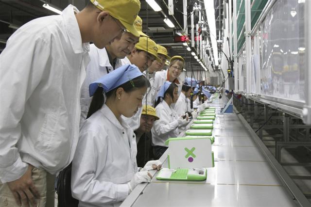 Production of the OLPC XO laptop kicks off at Quanta Computer's factory in Changshu, China